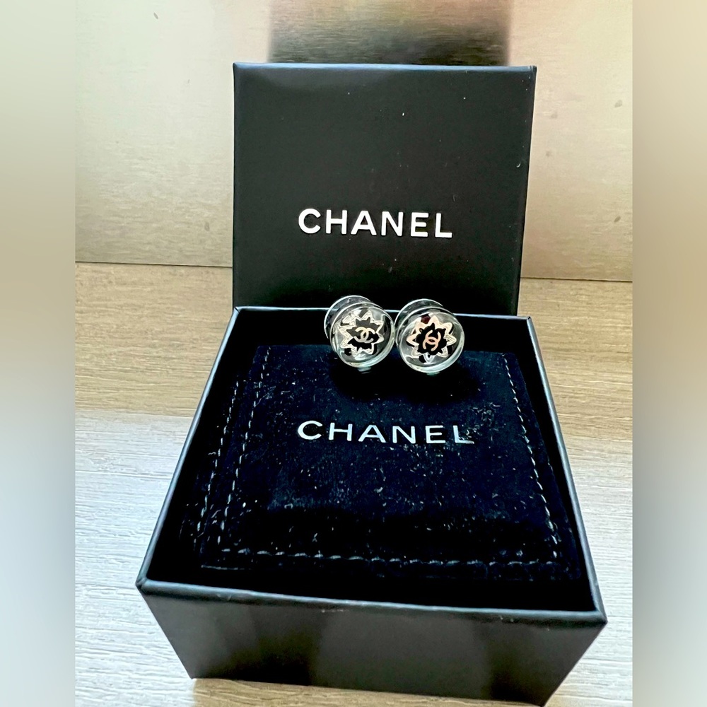 Chanel acrylic circle earrings with cc logo and flower design